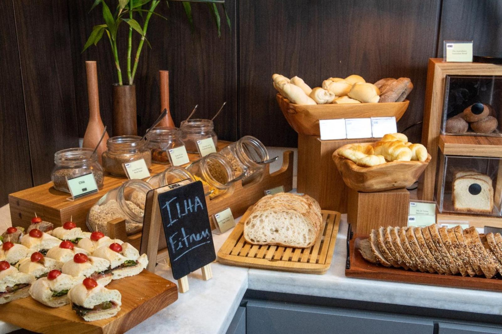 Art Hotel Transamerica Collection Porto Alegre Exterior photo A selection of breads and pastries at a buffet